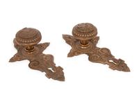 A Pair of Bronze Doorknobs from the Illinois Governor's Mansion