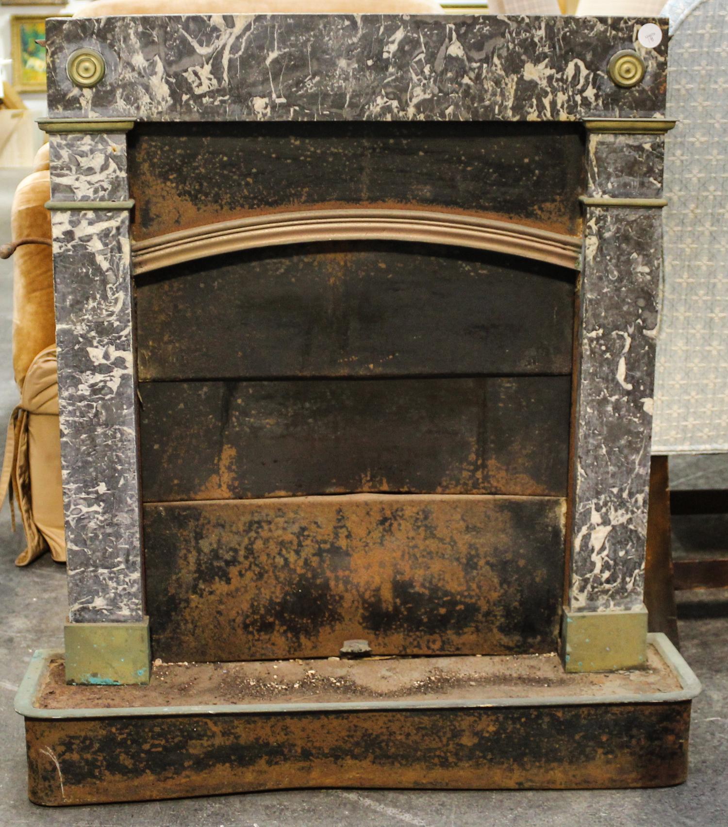 A Continental Marble Mounted Stove