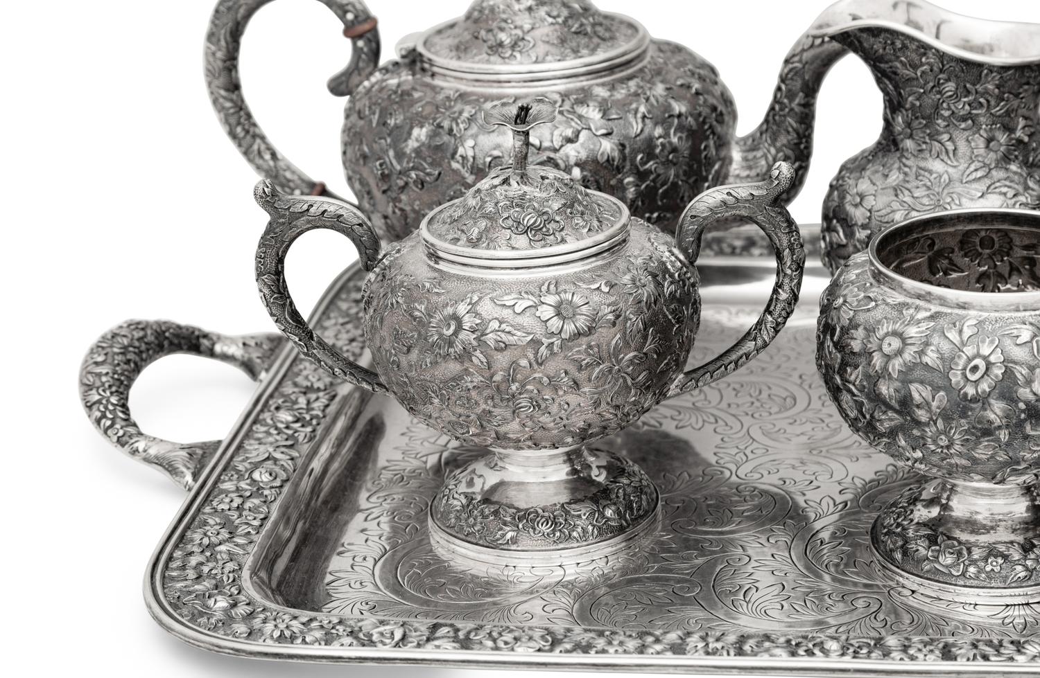 An American Silver Repoussé Seven-Piece Tea and Coffee Service