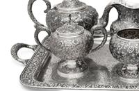 An American Silver Repoussé Seven-Piece Tea and Coffee Service