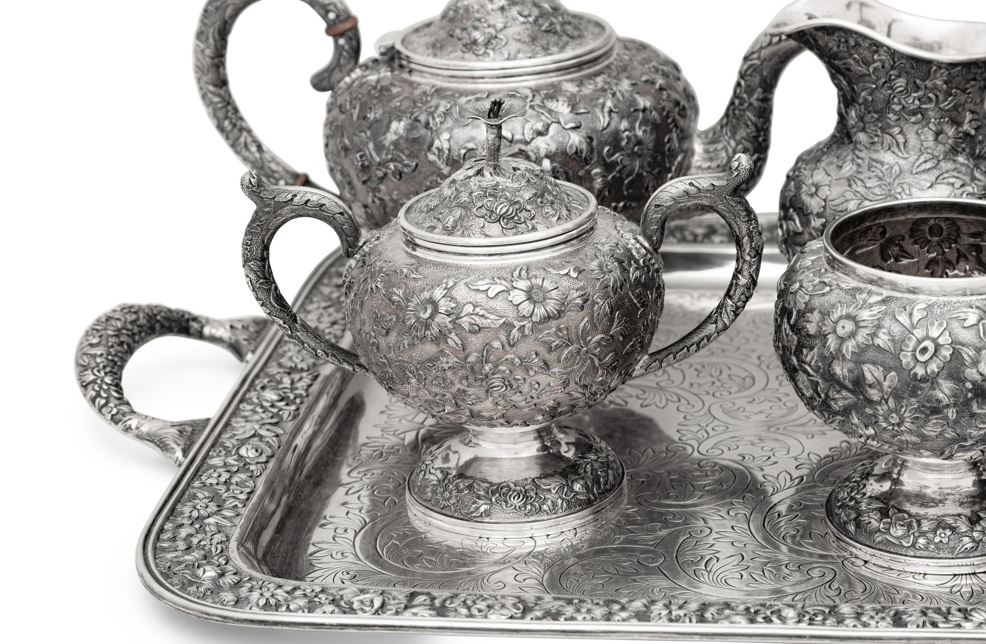 An American Silver Repoussé Seven-Piece Tea and Coffee Service