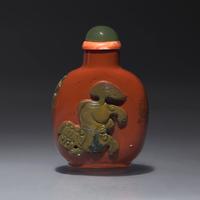 A Chinese Carved Jasper Snuff Bottle, Qing Dynasty, 19th Century — 清中期 羊肝瑪瑙雕獅子圖鼻煙壺