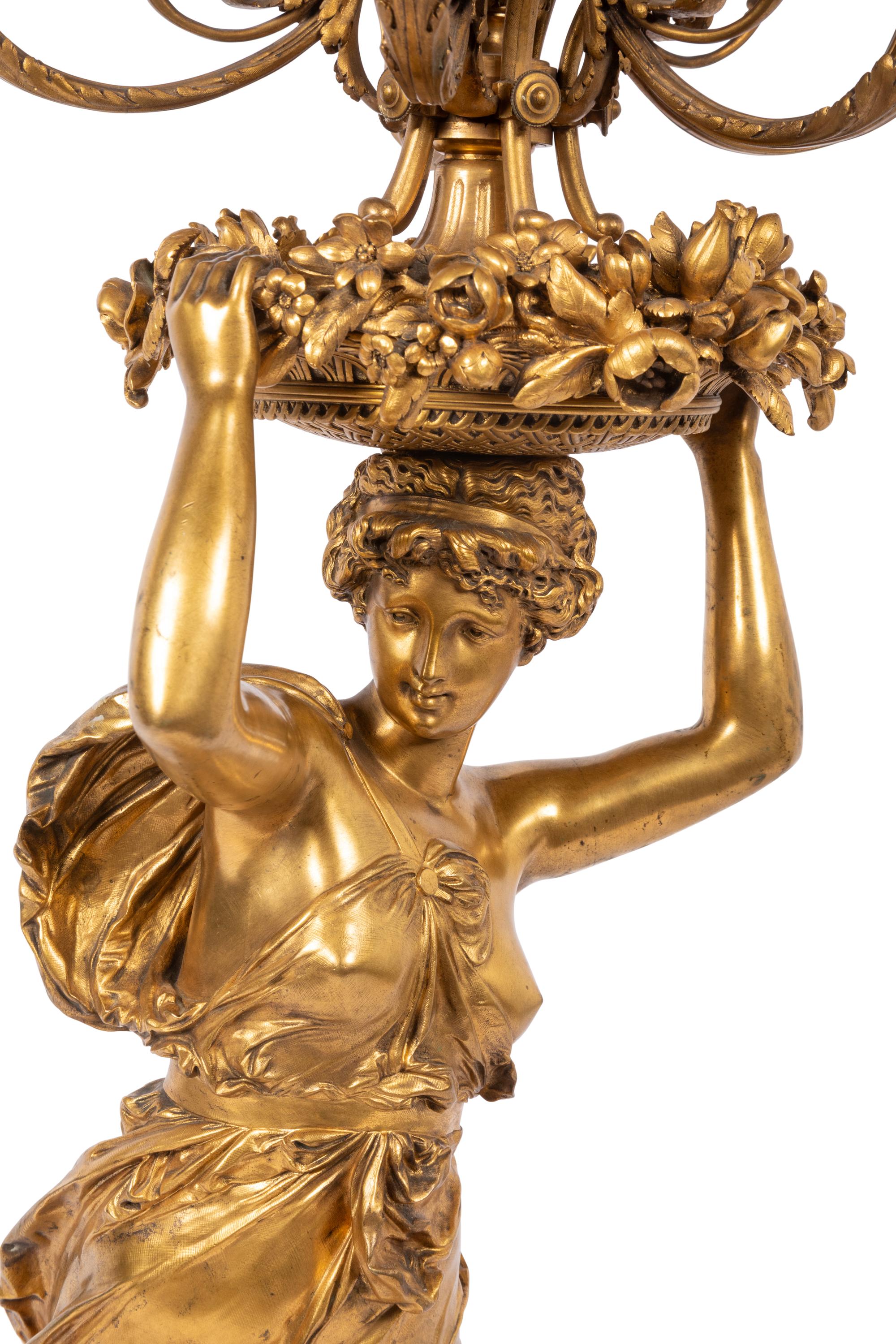 A Large French Gilt Bronze and Marble Figural Candelabrum