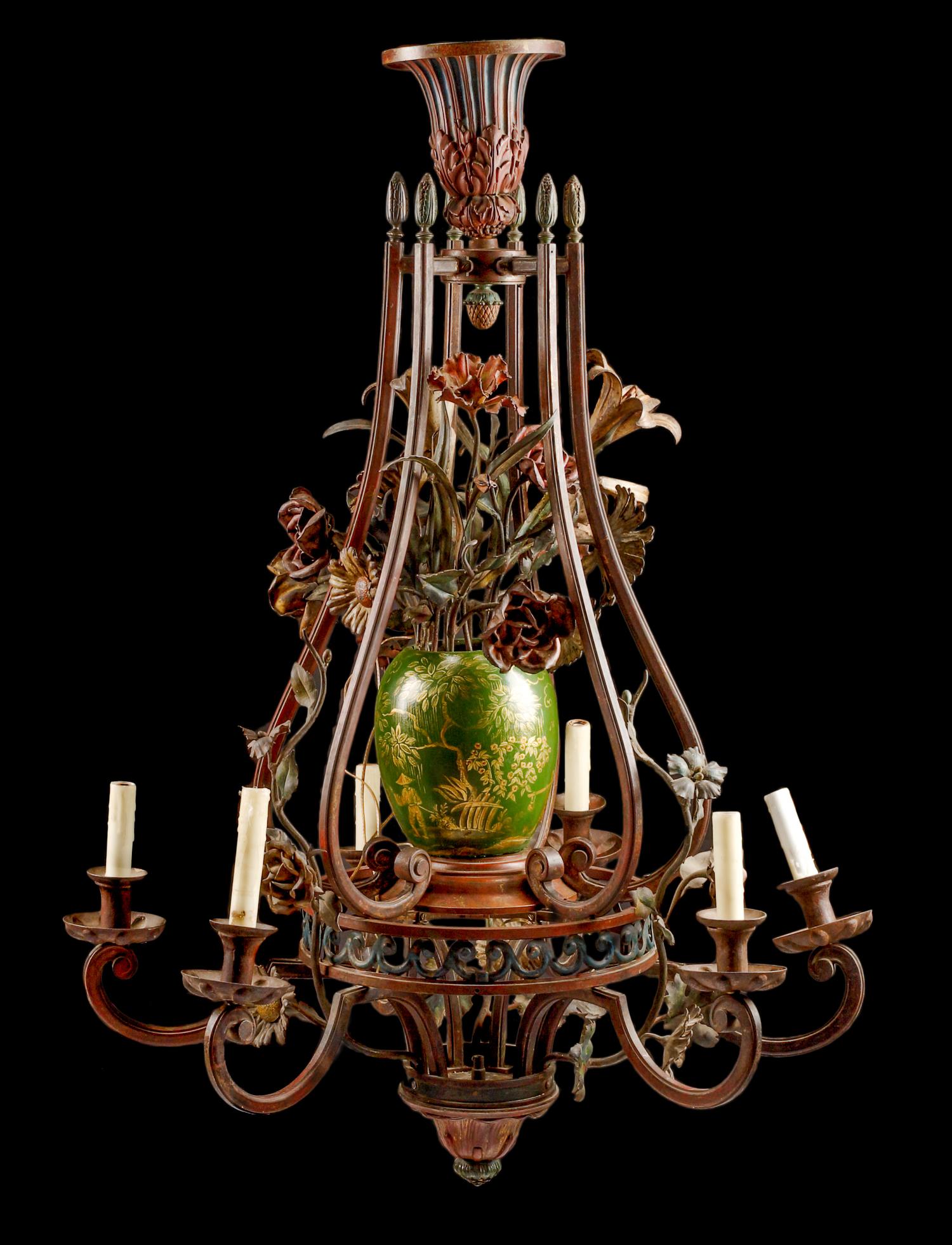 A Continental Polychromed Wrought Iron and Tole Six-Light Chandelier Height 44 x diameter 31 inches.