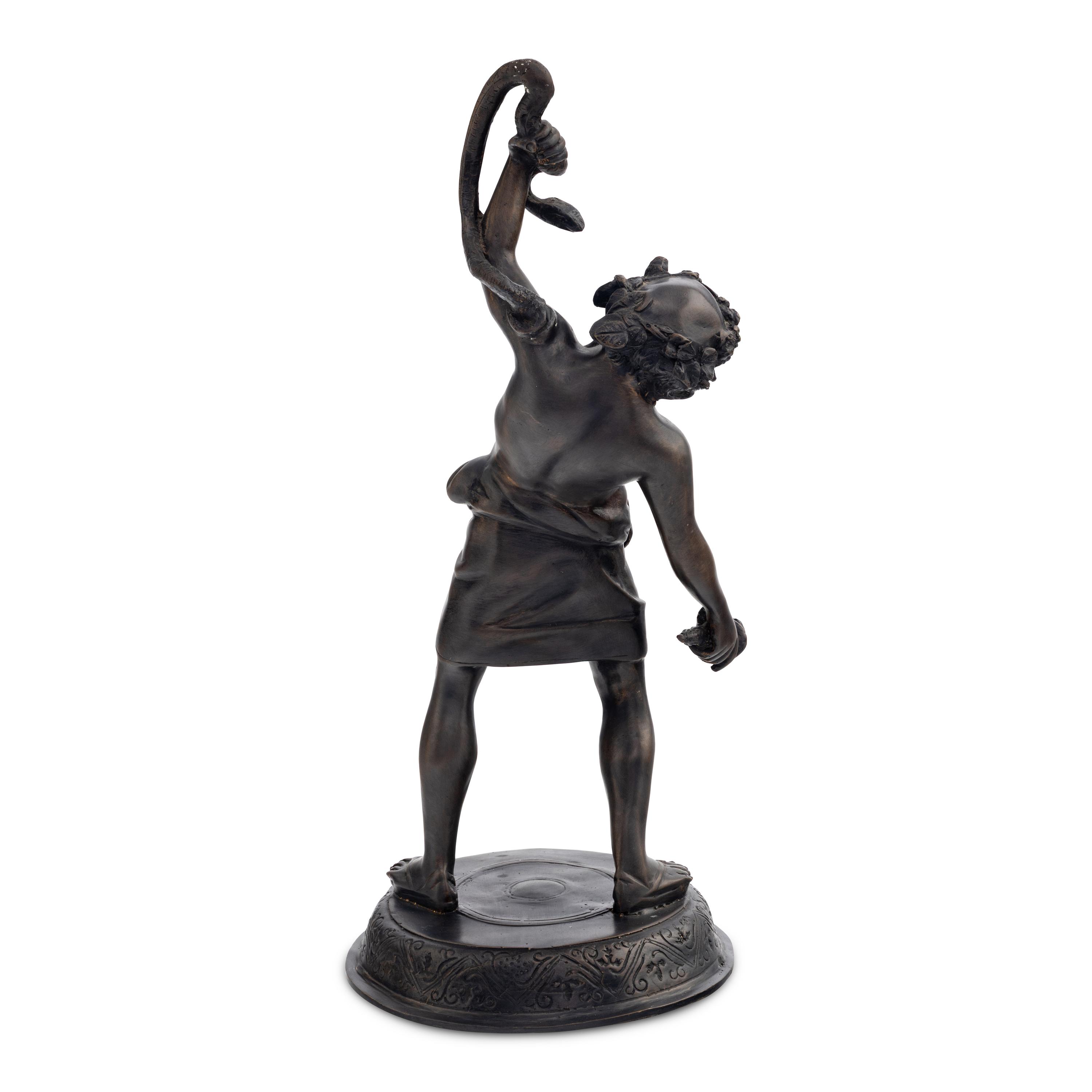 A Cast Metal Figure of Silenus
