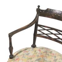 A Pair of Regency Ebonized and Grisaille-Decorated Armchairs