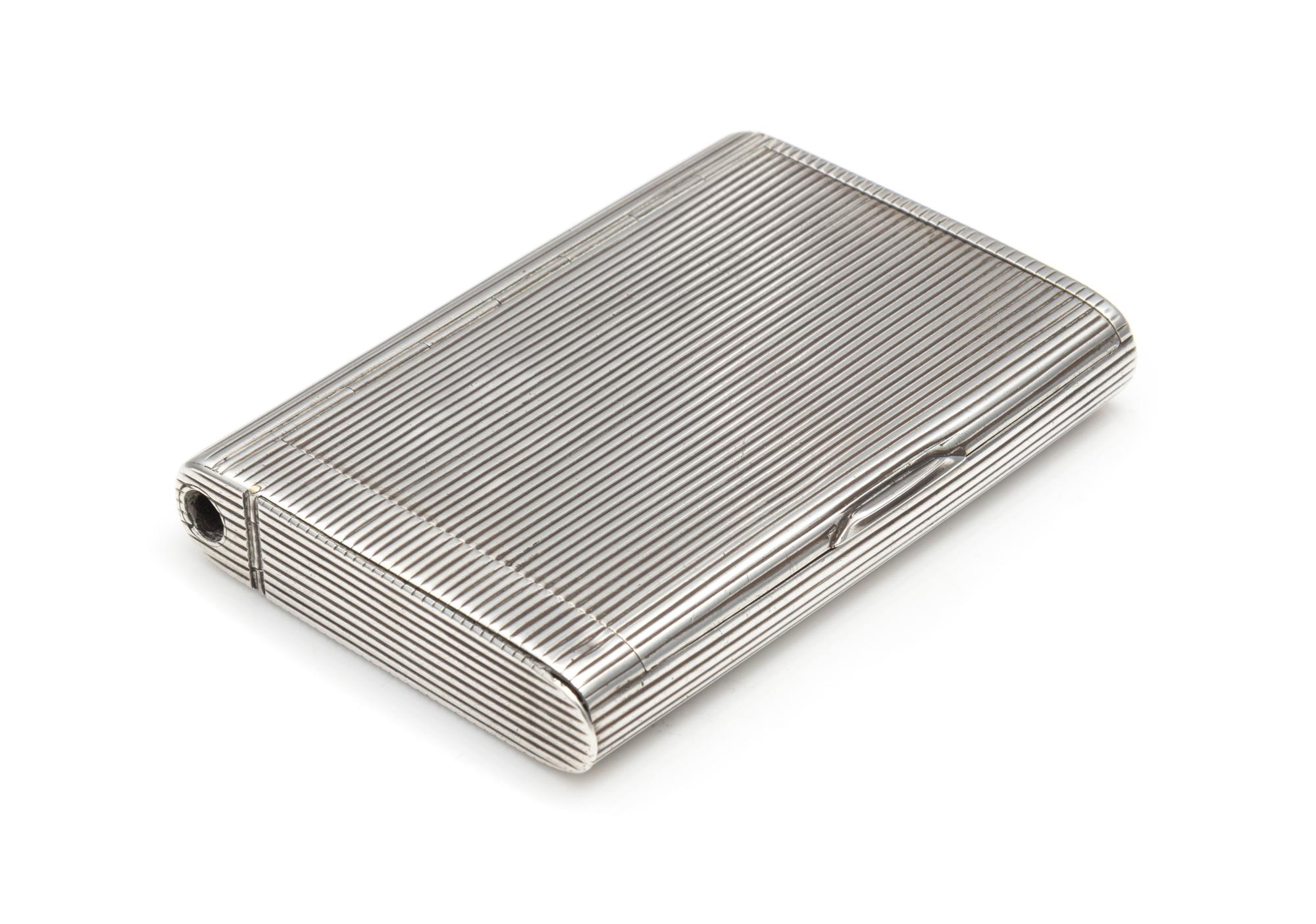 A Russian Silver Cigarette Case, Maker's Mark Cyrillic A.R., Moscow, Late 19th/Early 20th Century, the reeded case fitted with a side-m