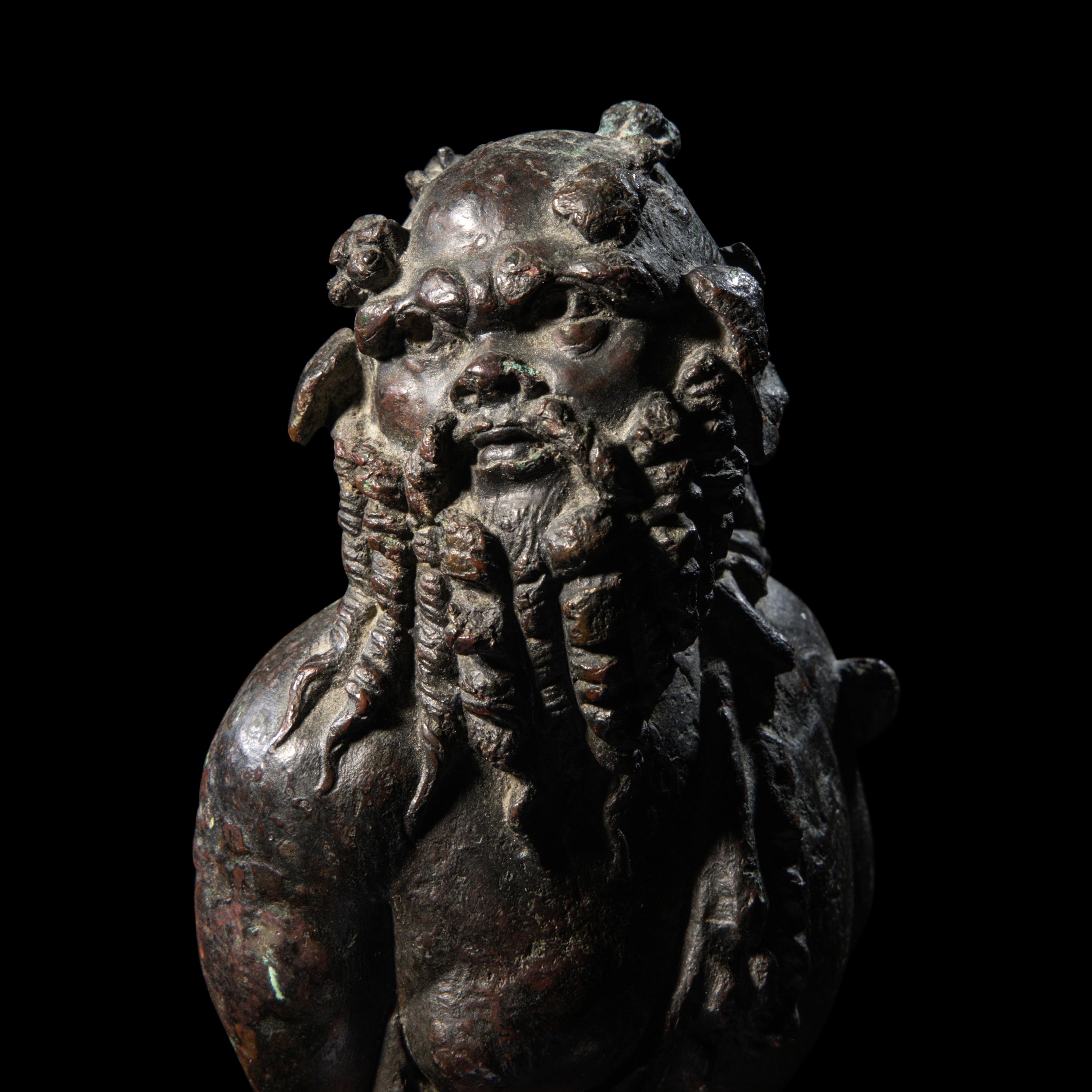 A Roman Bronze Silenus Applique