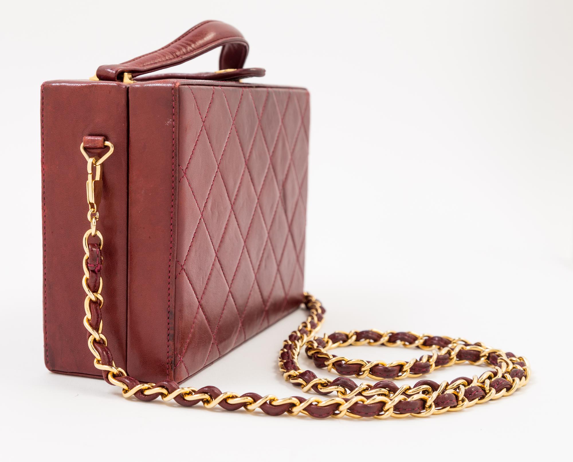 A Chanel Burgundy Lambskin Quilted Box Bag, 7.5" x 5.25" x 2.5"; Strap drop: 18".