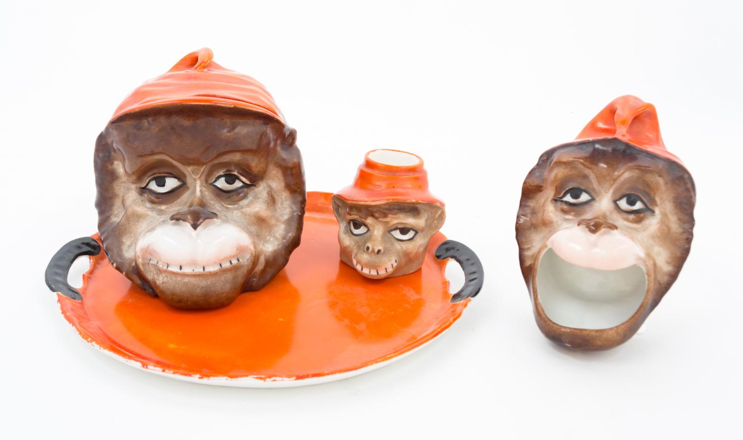 An Austrian Figural Four Part Ceramic Smoker's Set Width of tray over handles 10 1/4 inches. — 19TH/20TH CENTURY