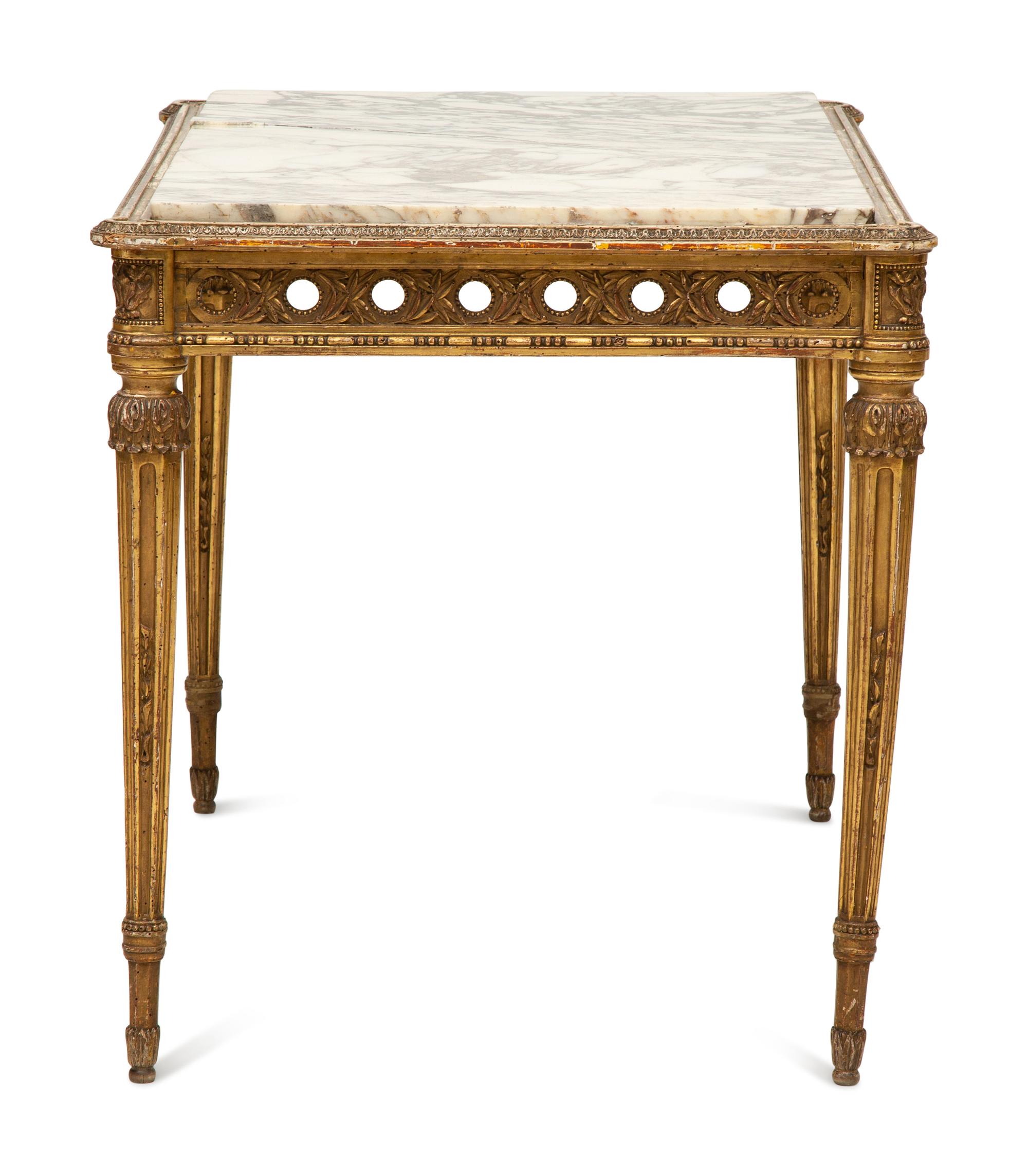 A Louis XVI Style Marble Top Giltwood Center Table