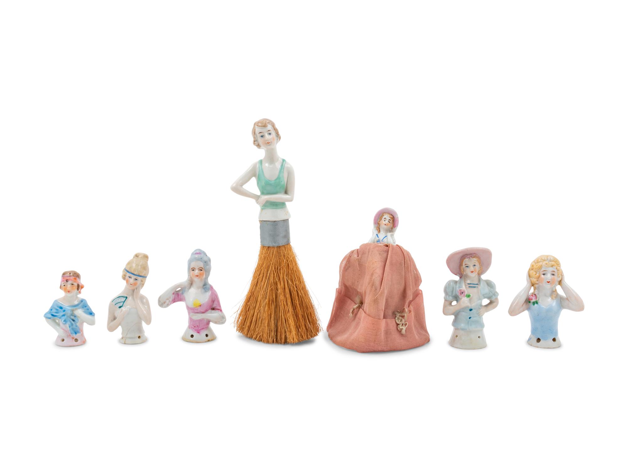 A Group of Seven Porcelain Brush Handles