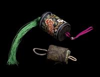 A Group of Chinese Jade and Hardstone Archers Rings with an Embroidered Silk Case