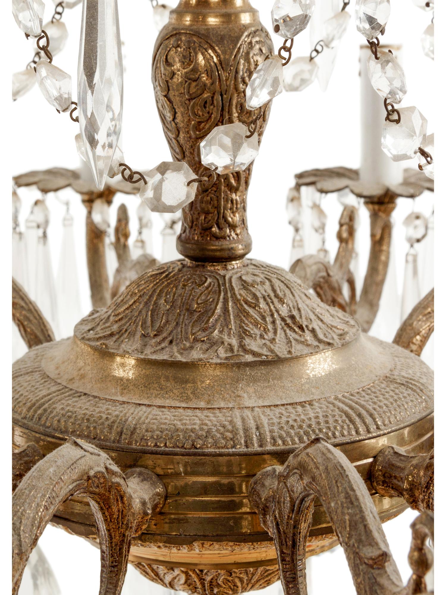 A Continental Gilt Metal Twelve-Light Chandelier