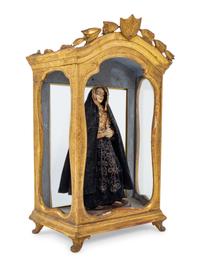 A Continental Giltwood Reliquary with a Painted Figure of a Saint
