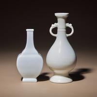 Two Chinese White Glazed Porcelain Vases, Qing Dynasty — 清 雙龍耳暗刻龍鳳紋白釉瓶及白釉四方小瓶