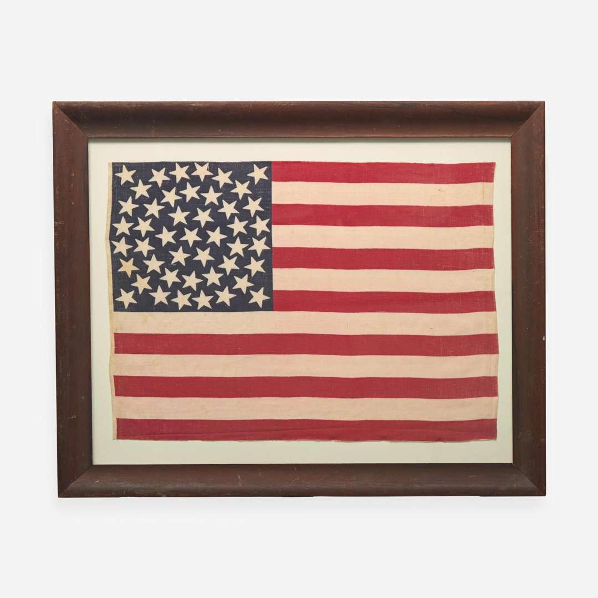 A 44-Star printed American Parade Flag commemorating Wyoming statehood 1890-1896