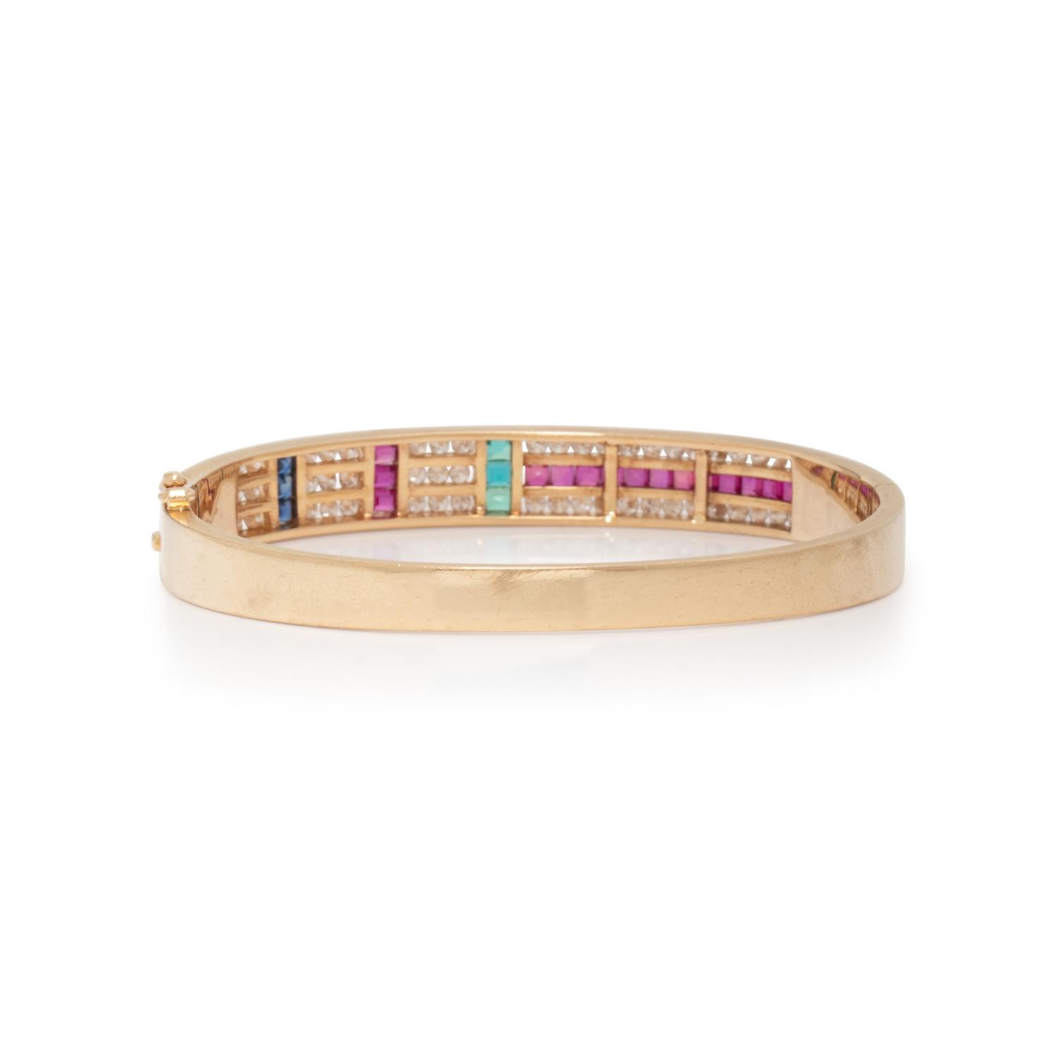 RUBY, SAPPHIRE, EMERALD, AND DIAMOND BANGLE BRACELET
