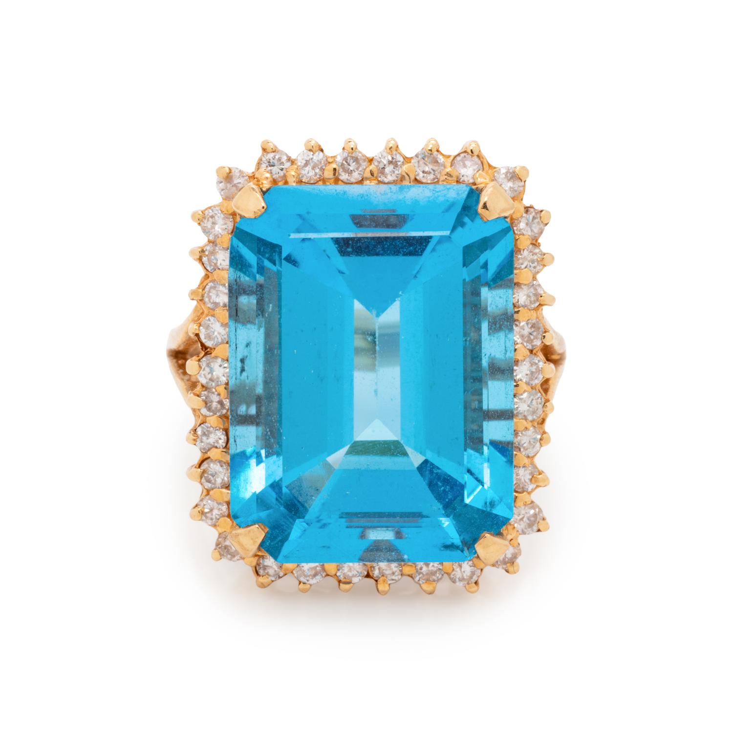 BLUE TOPAZ AND DIAMOND RING