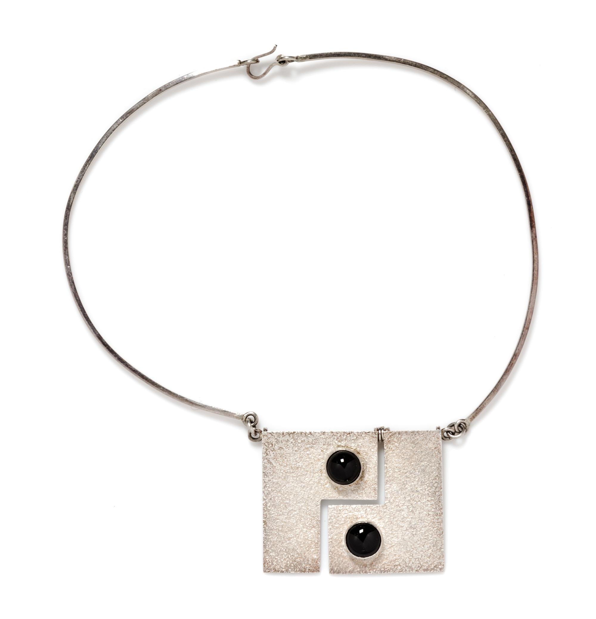 An Oswaldo Guayasamin Silvertone Modernist Kinetic Necklace.