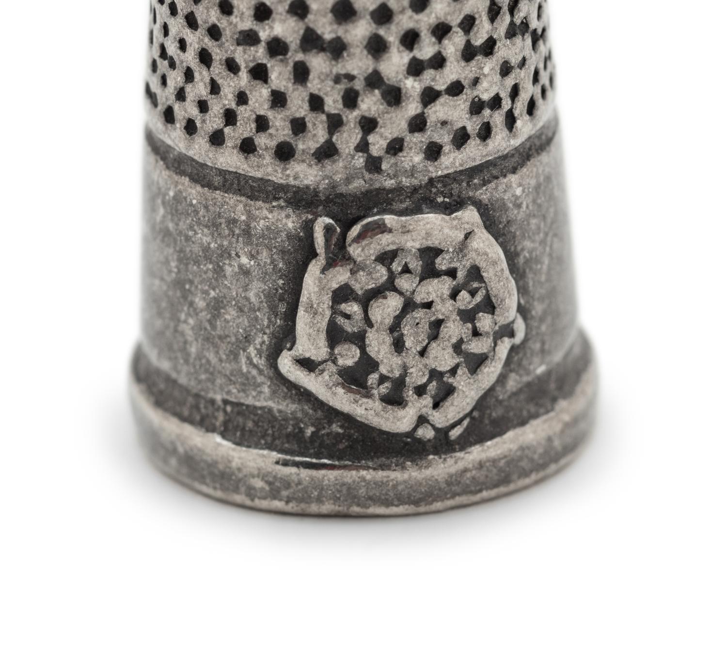 A Collection of Thimbles and a Tatting Shuttle