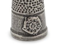 A Collection of Thimbles and a Tatting Shuttle
