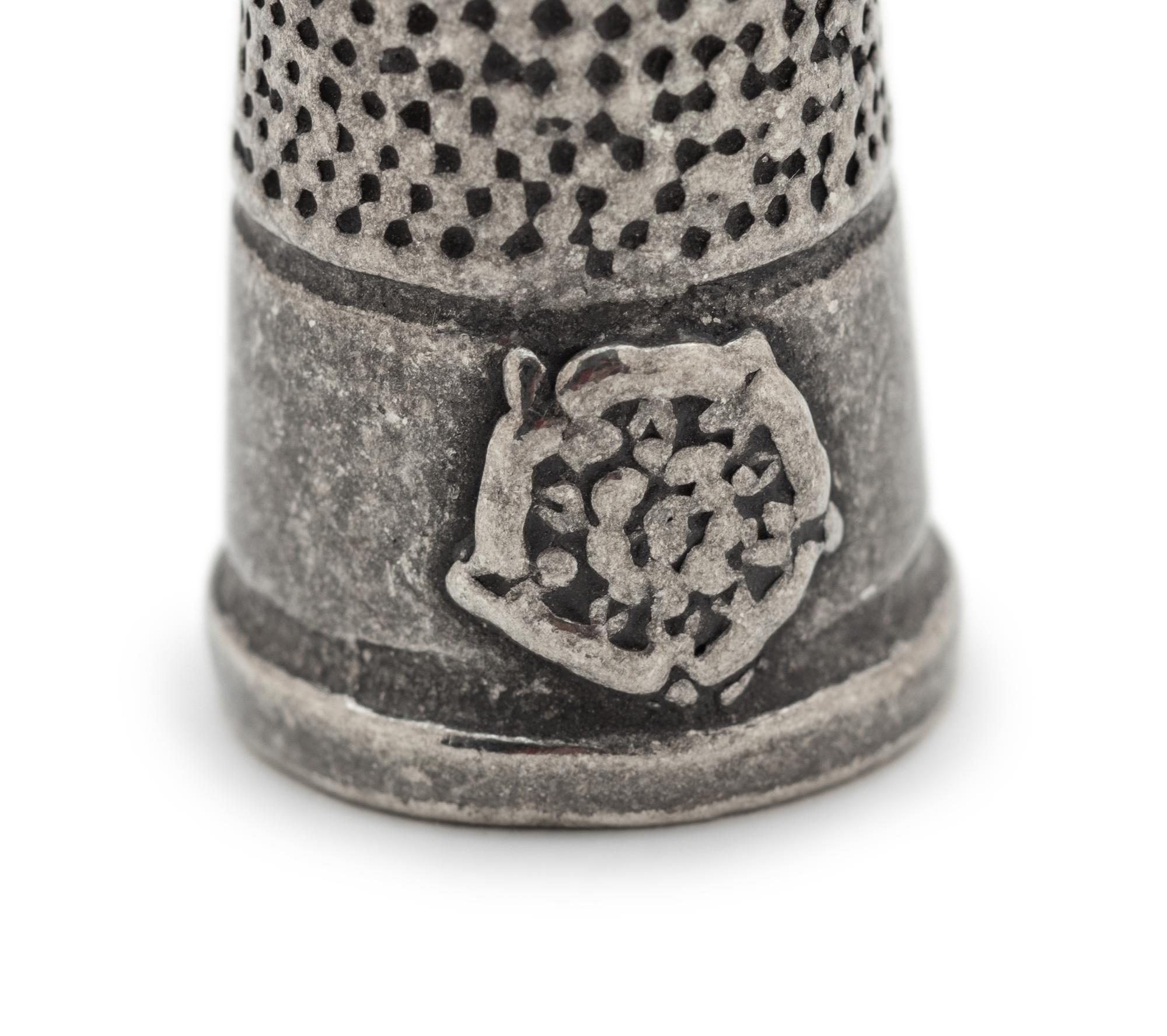 A Collection of Thimbles and a Tatting Shuttle