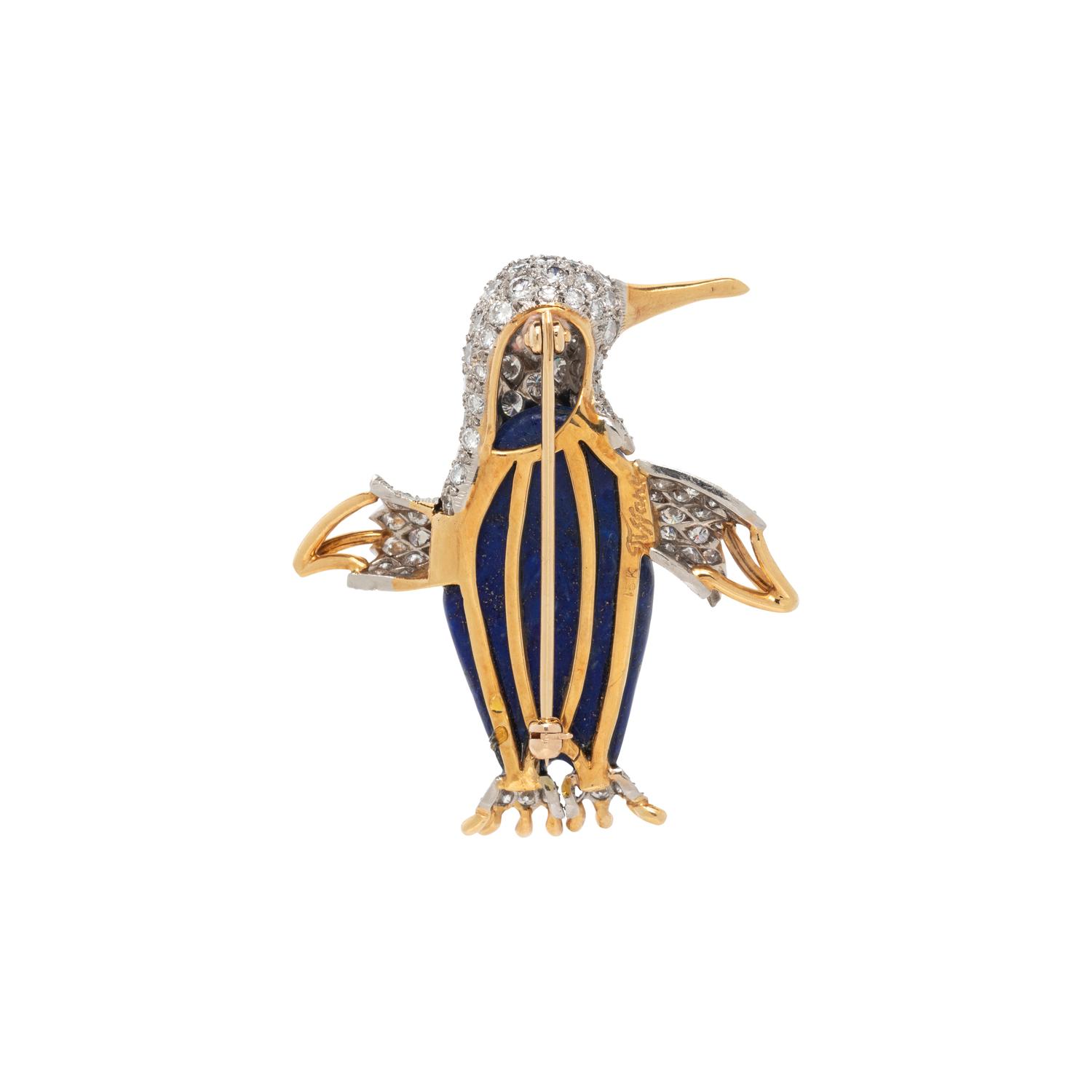 TIFFANY & CO., LAPIS LAZULI, DIAMOND, AND EMERALD PENGUIN BROOCH