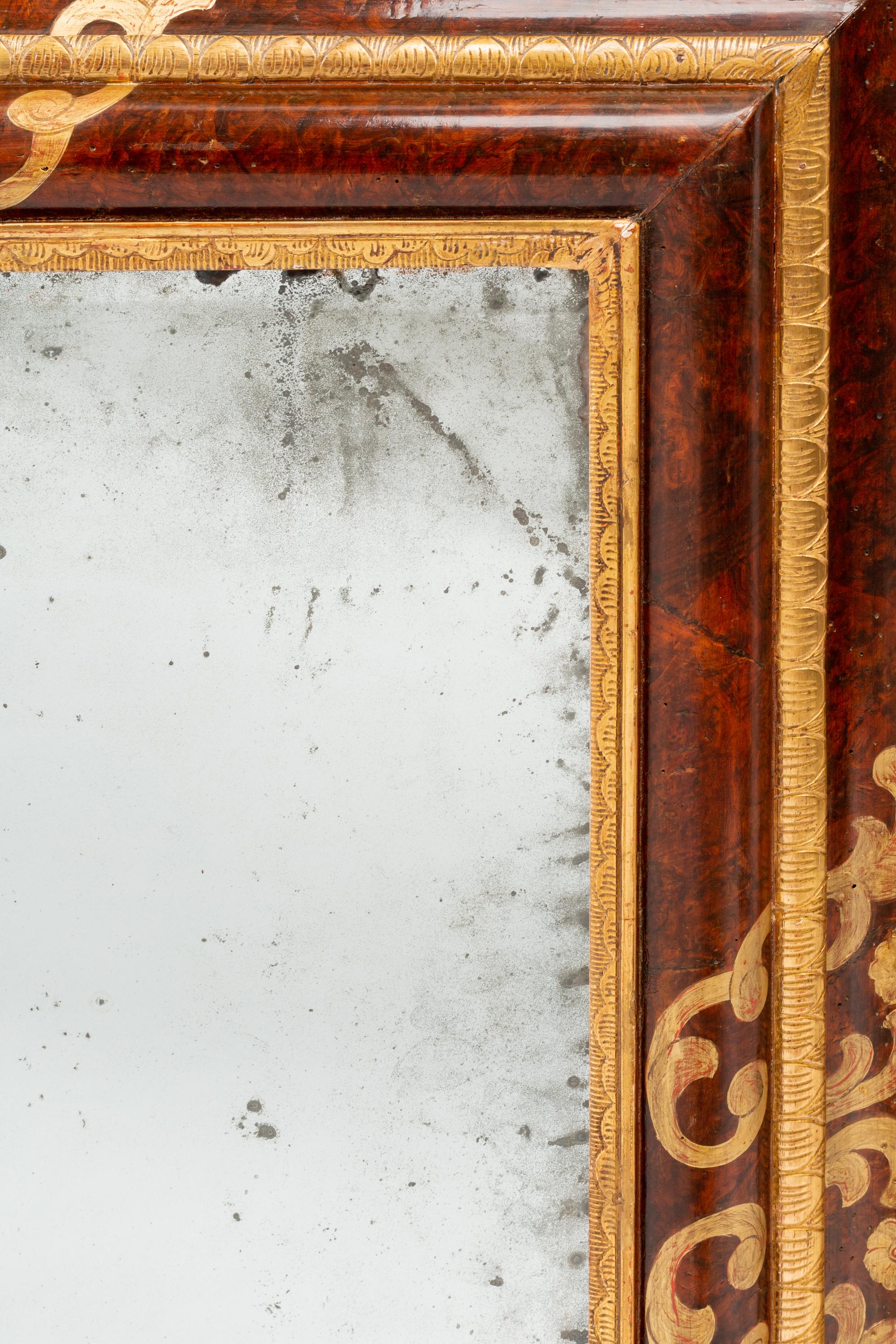 A Continental Parcel Gilt Burl Walnut Mirror
