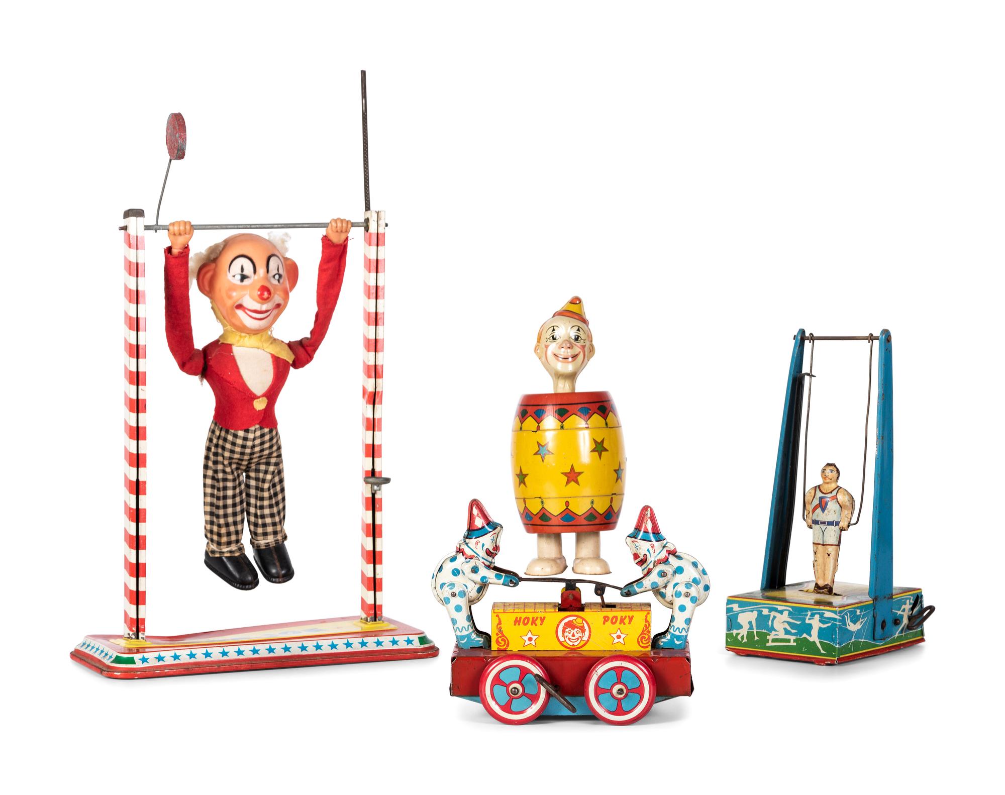 Four Tin Circus and Clown Toys