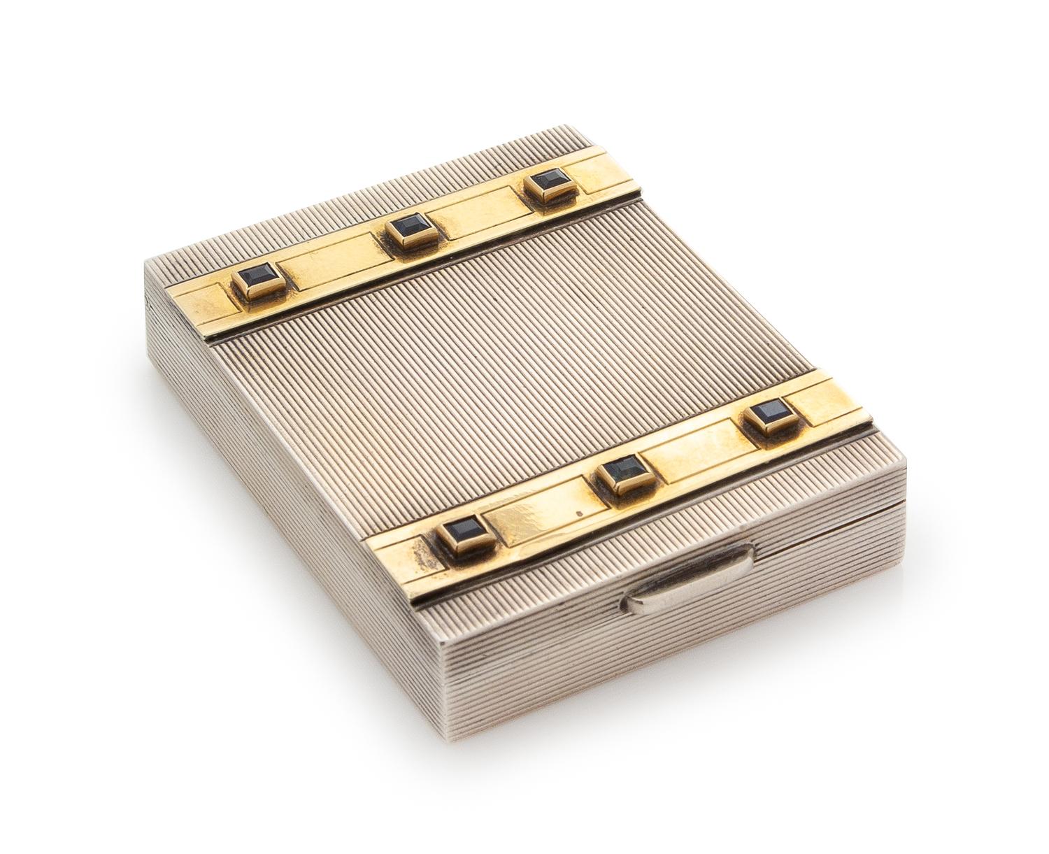 A French Silver, 14-Karat Gold and Sapphire Inset Compact, Cartier, Paris, First Half 20th Century, the case with reeded decoration, th