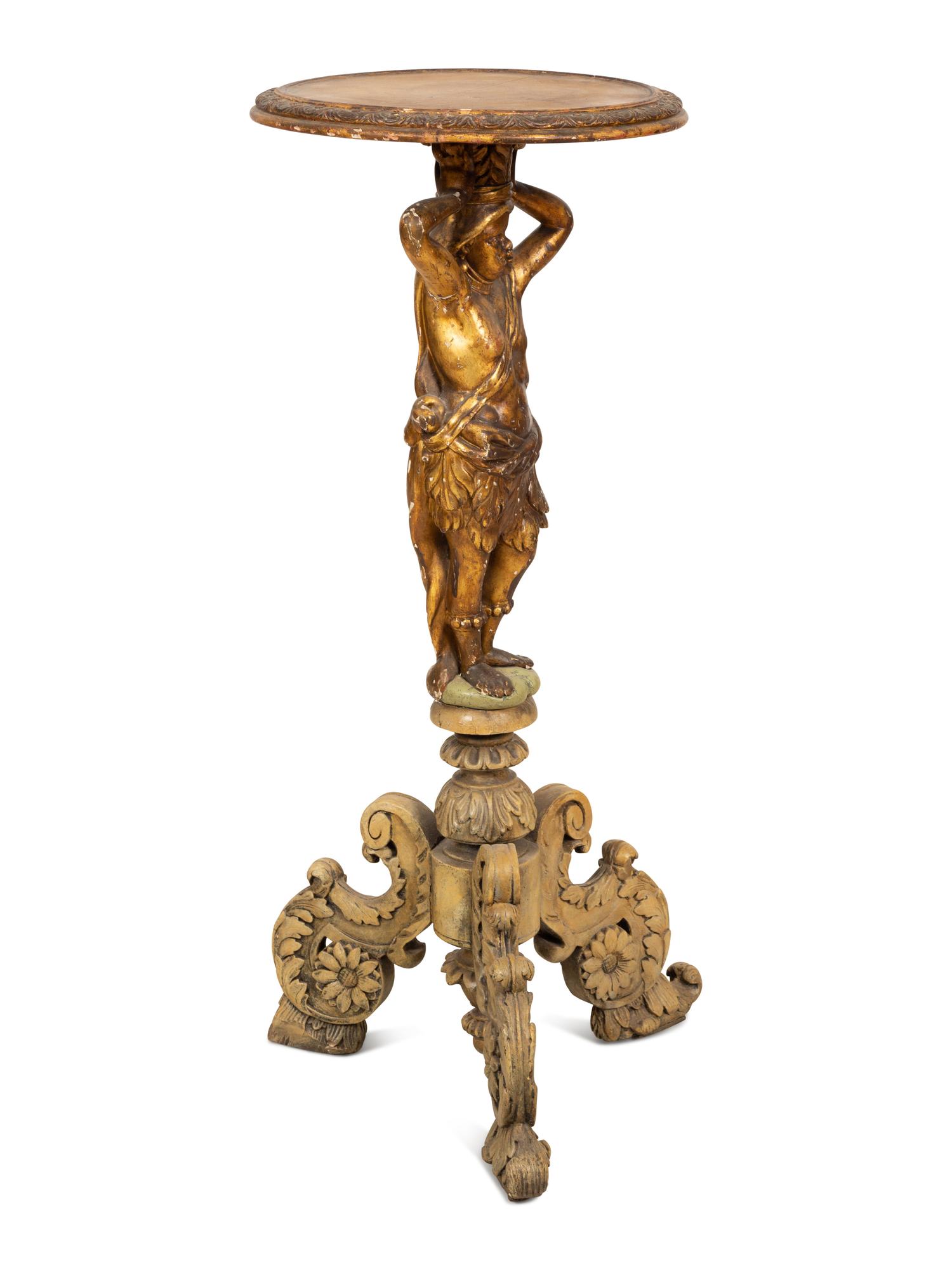 An Italian Painted and Parcel Gilt Figural Pedestal Table