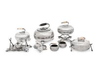 A Group of Eight Curling Stone-Form Silver-Plate Table Articles