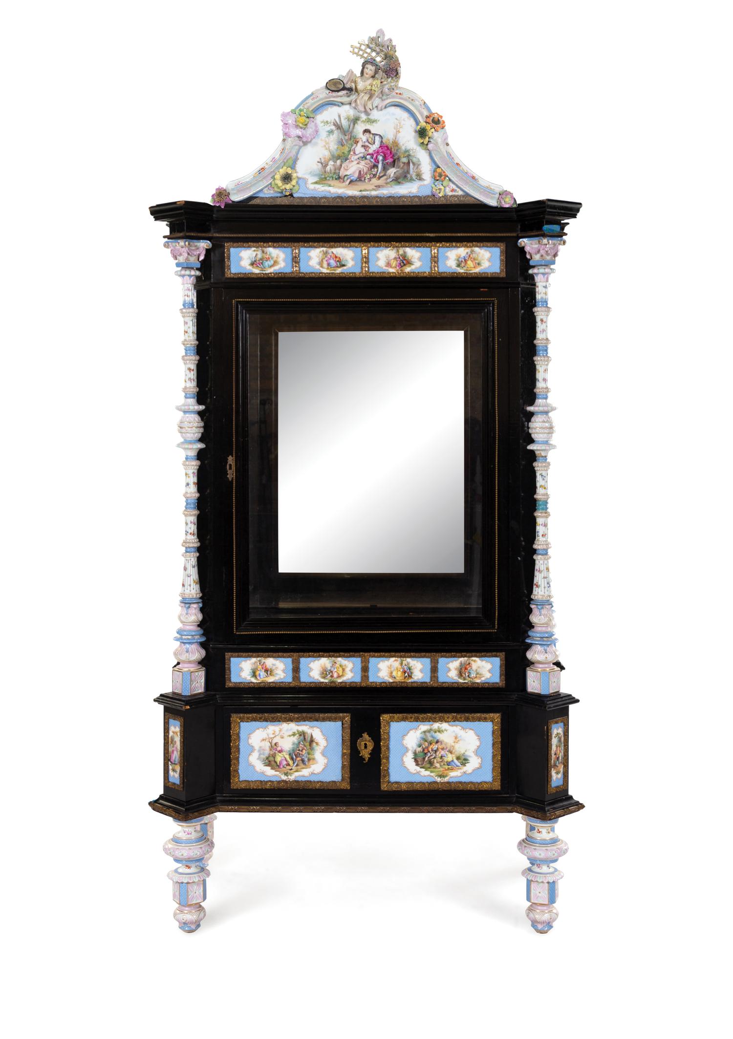 A Meissen and Berlin (K.P.M.) Porcelain Mounted Ebonized Vitrine Cabinet