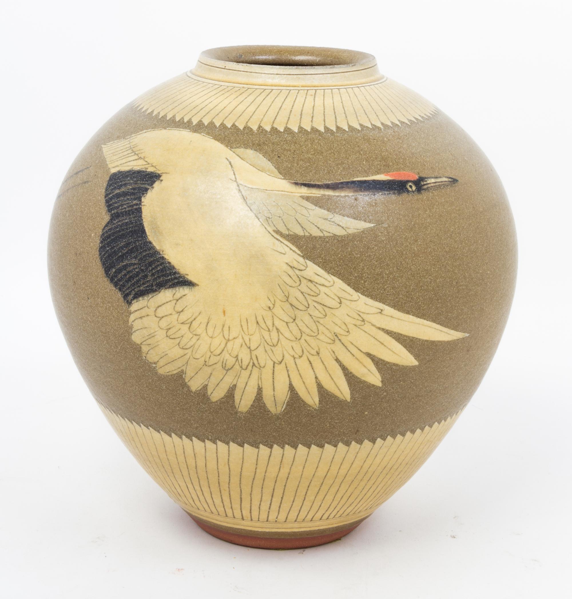A Japanese Painted Pottery Jar Height 11 1/4 inches.