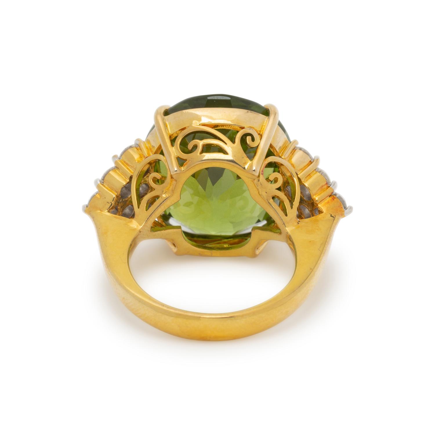 PERIDOT, DIAMOND, AND YELLOW GOLD RING