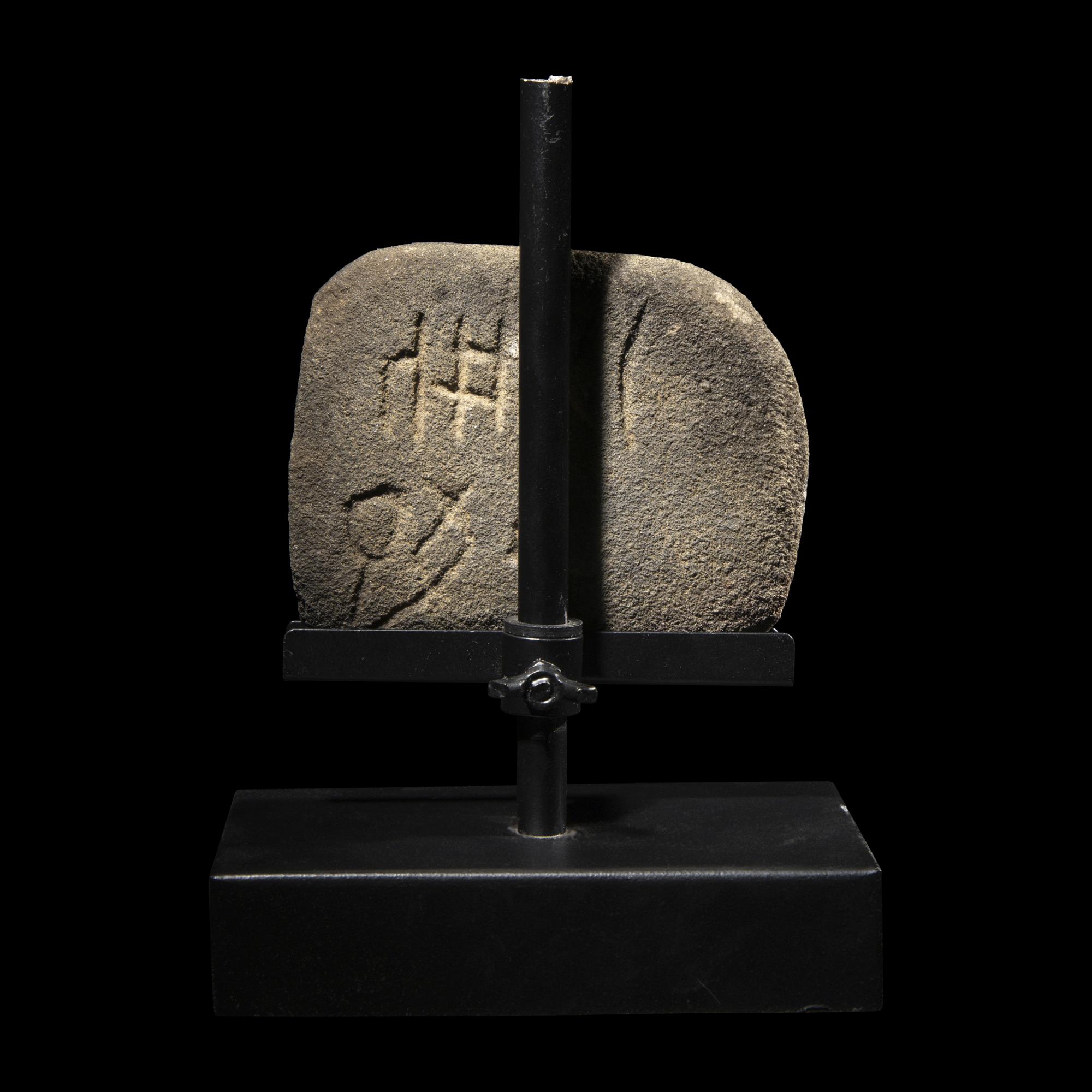 A South Arabian Stone Plaque of a Ram with Inscription