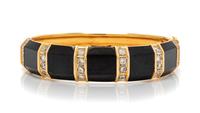 An 18 Karat Yellow Gold, Diamond and Onyx Bangle Bracelet, 35.10 dwts.