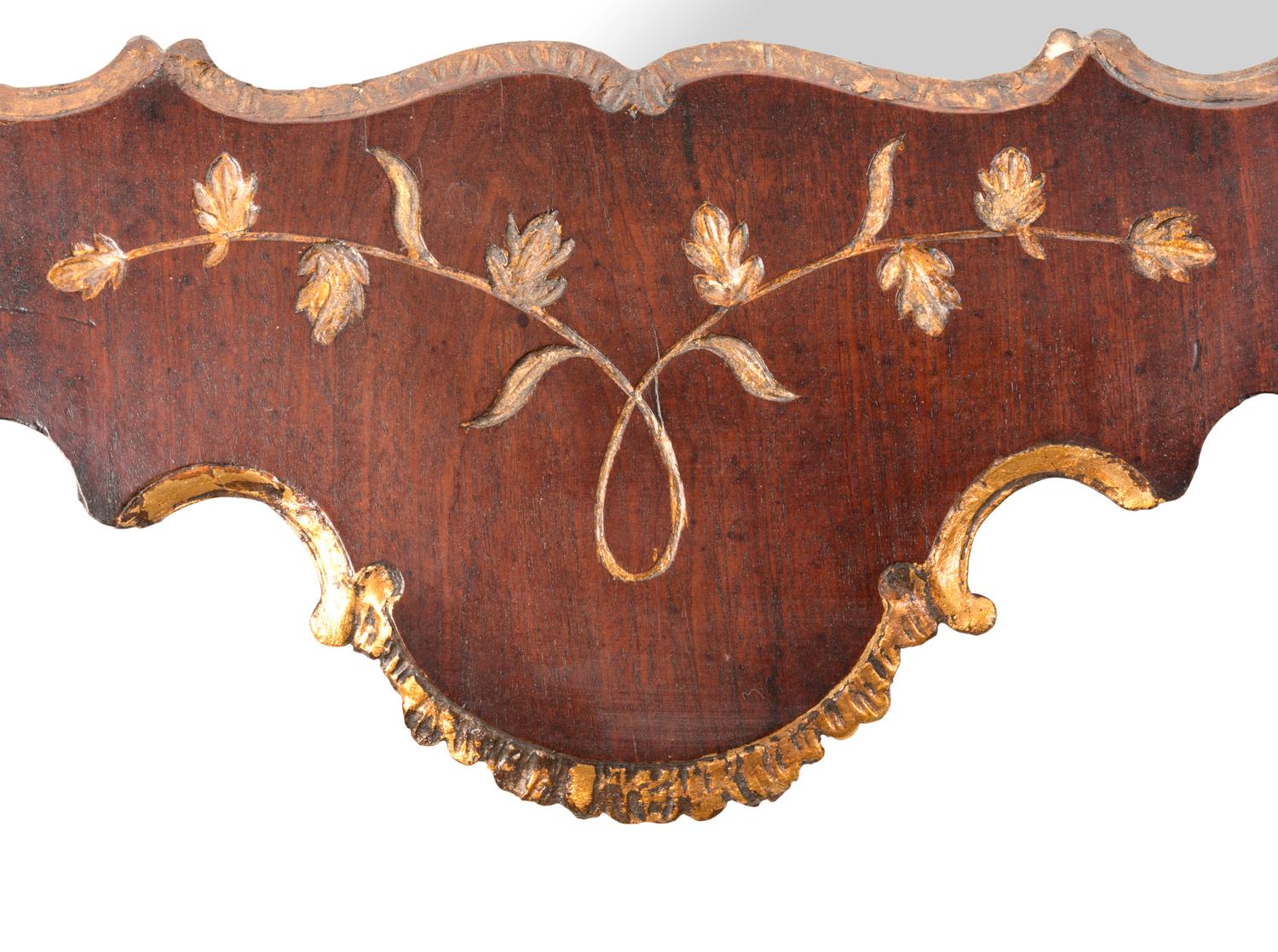 A George III Parcel Gilt Mahogany Mirror