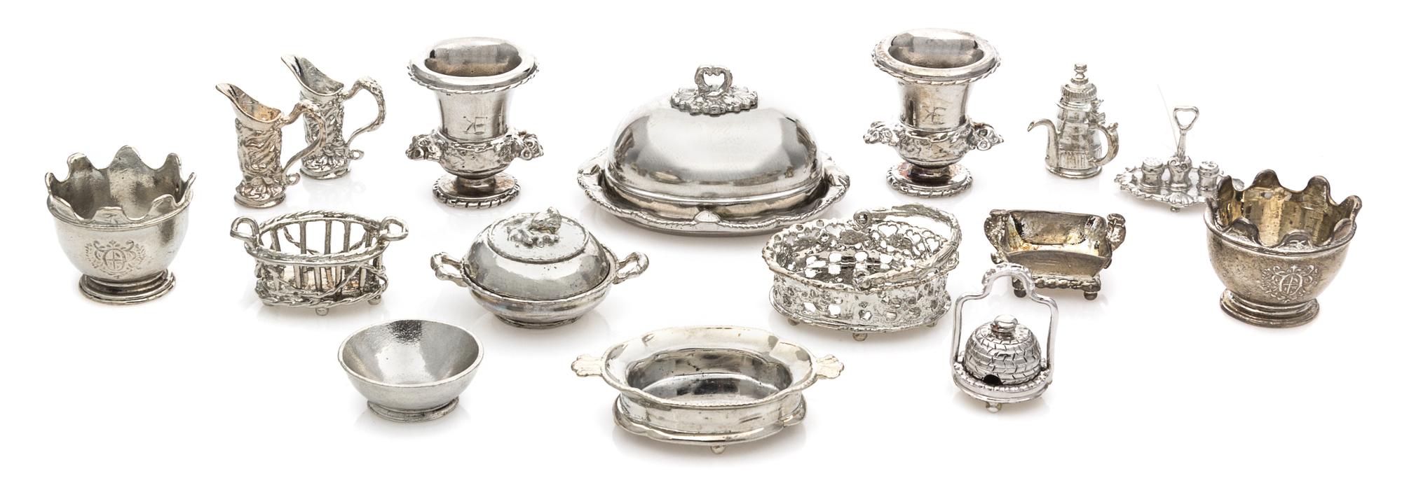 A Group of Silver and Silvered Bronze Table Articles Width of widest 1 3/4 inches. — Eugene Kupjack