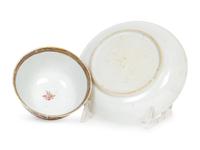 A Chinese Export Porcelain Famille Rose Cup and Saucer