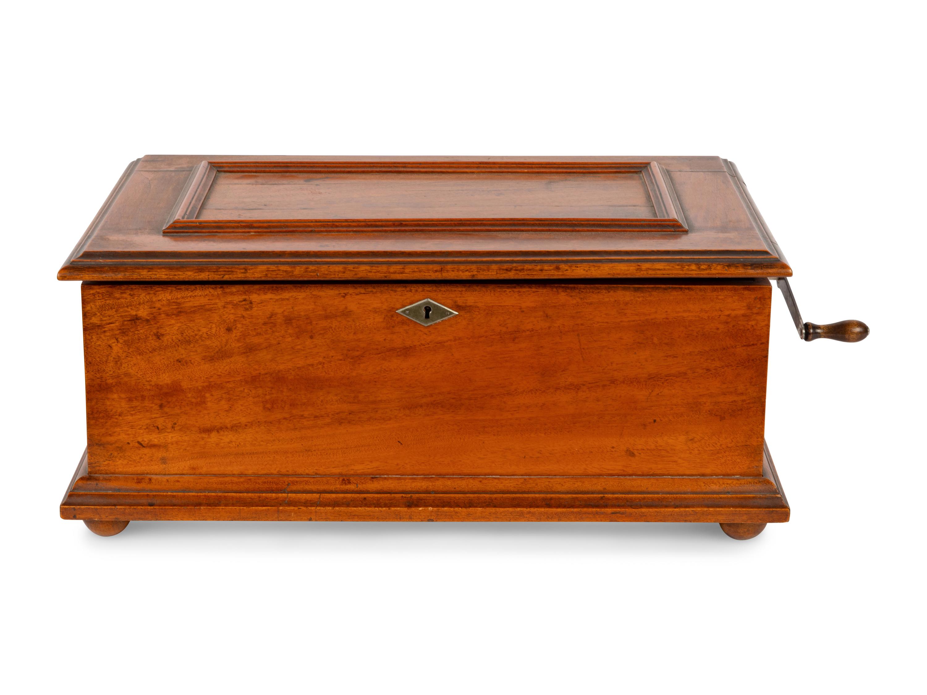 A Capital Cuff Model C Music Box