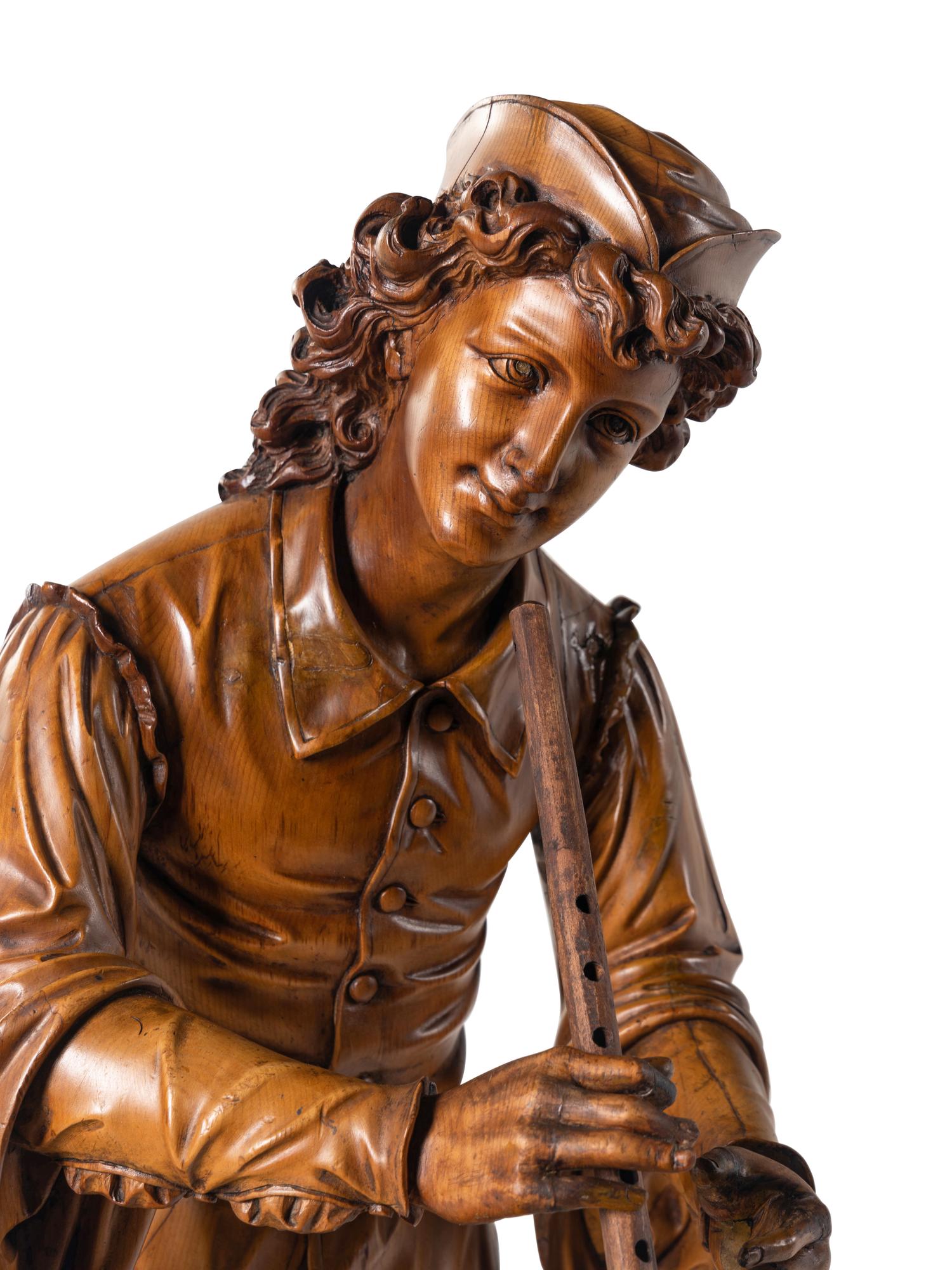 A Venetian Carved Wood Figure of a Musician in the Manner of Valentino Besarel