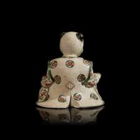 A Japanese Satsuma Type Stoneware Figure of a Boy, Late Edo to Meiji Period