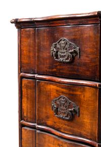 A Dutch Walnut Serpentine-Front Chest of Drawers