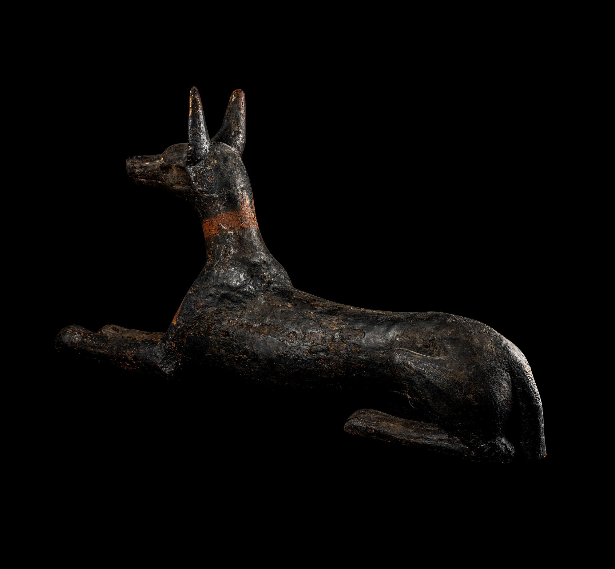 An Egyptian Painted Wood Anubis