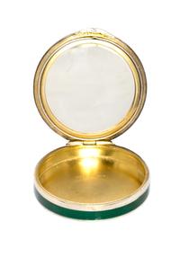 A Continental Silver and Enamel Compact, Import Mark C&C, London, 1925, of circular form, the lid with gilt and red foliate elements on