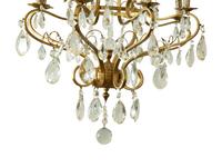 A Louis XV Style Gilt Metal and Cut Glass Six-Light Chandelier