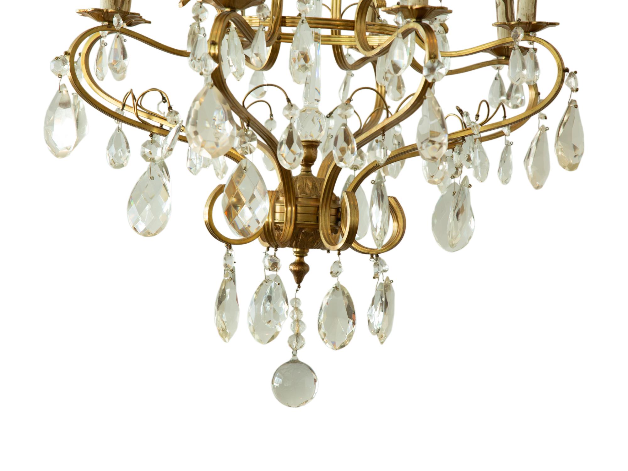 A Louis XV Style Gilt Metal and Cut Glass Six-Light Chandelier