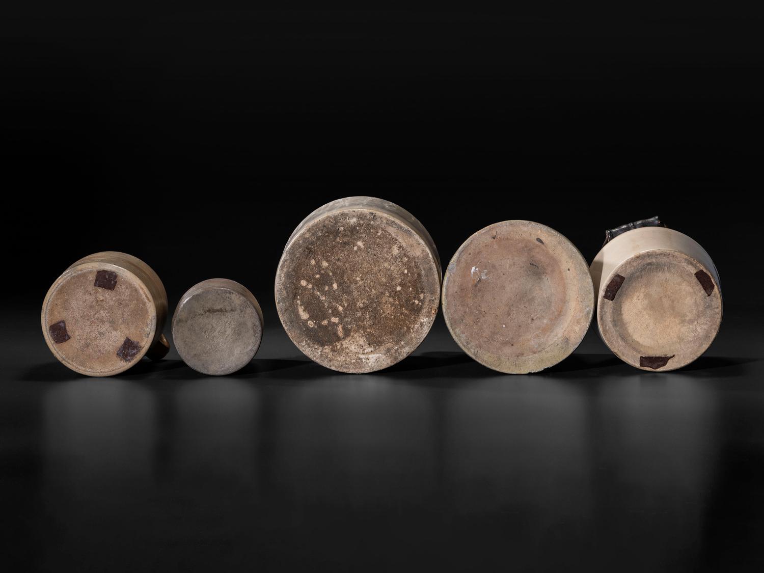Sixteen Stoneware Vessels